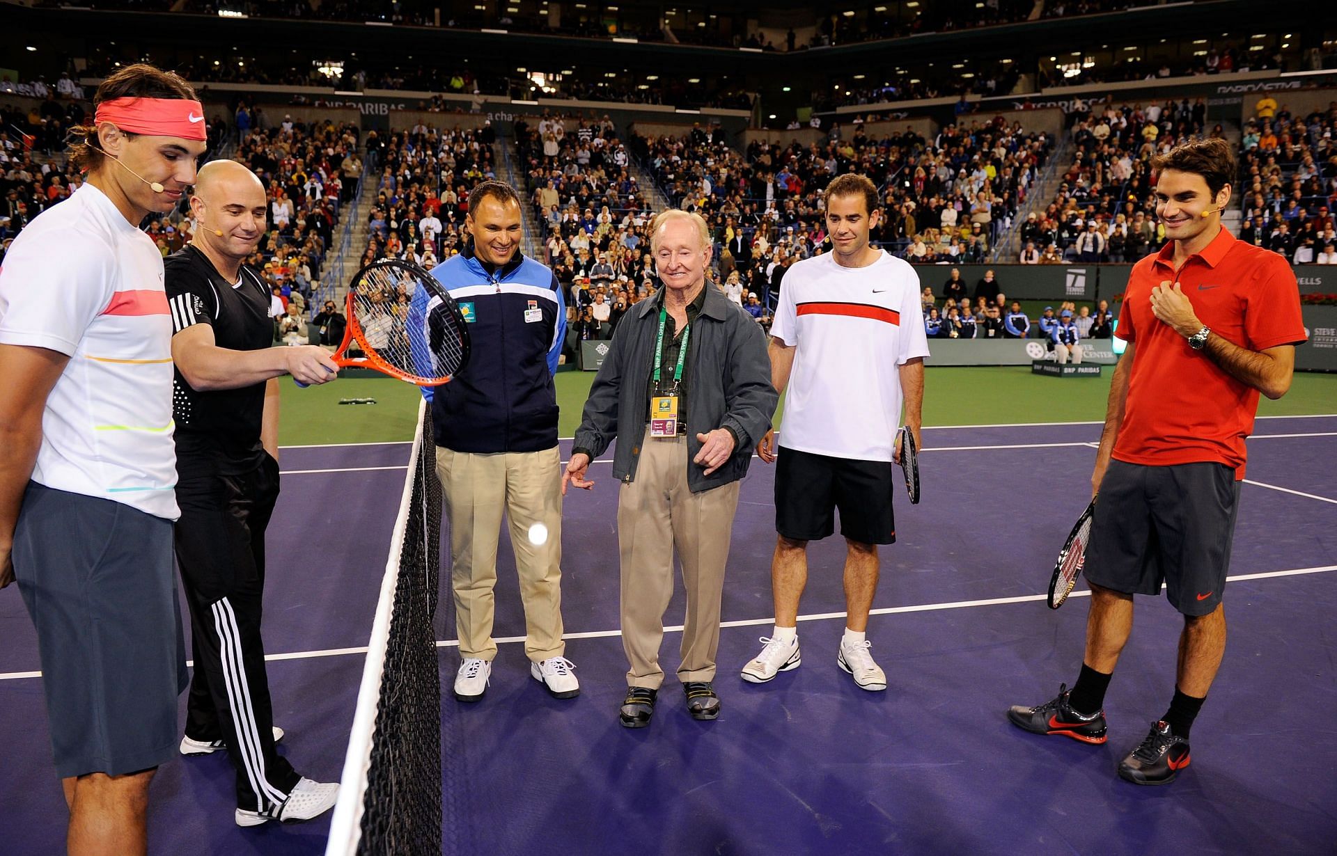 Four legends look on at the Hit for Haiti exhibition